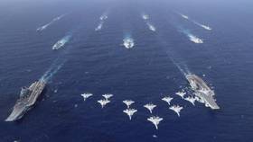 共軍遼寧艦、山東艦首次進行雙航艦編隊演習。新華社