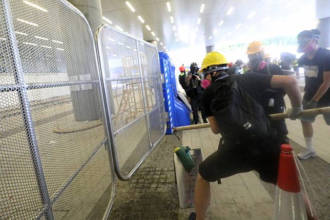 Anti-government protesters damage the Legislative Council Complex building, Admiralty, last month. Photo: SCMP
