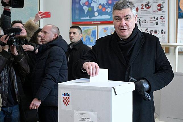 Croatian President Zoran Milanovic votes at a polling station during the second round of the presidential election in Zagreb, Croatia, Jan. 12, 2025. Voting for Croatia's presidential runoff began at 7 a.m. local time on Sunday, with over 3.7 million eligible voters across the country choosing between incumbent President Zoran Milanovic and his rival Dragan Primorac. (Davor Puklavec/PIXSELL via Xinhua)