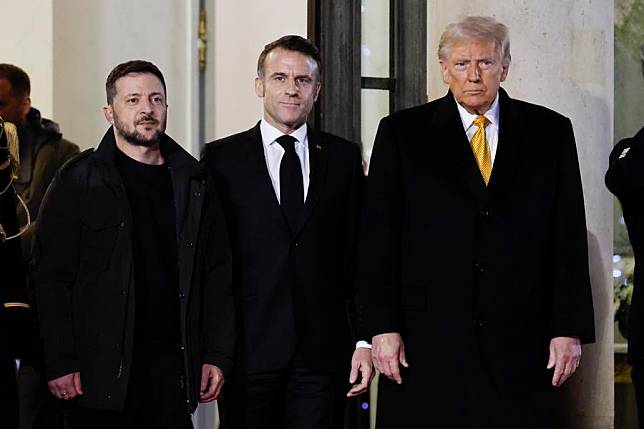 French President Emmanuel Macron &copy;, U.S. President-elect Donald Trump &reg; and Ukrainian President Volodymyr Zelensky are pictured after their meeting in Paris, France, Dec. 7, 2024. (Photo by Henri Szwarc/Xinhua)