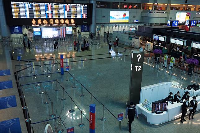 An empty departure hall Taiwan’s Taoyuan International Airport. Photo: EPA-EFE