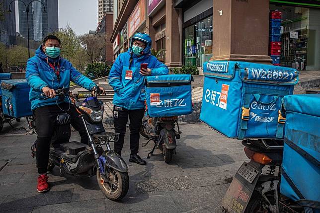 China’s established home delivery system played an important role in getting food and other necessities to residents during the Wuhan lockdown. Photo: EPA-EFE