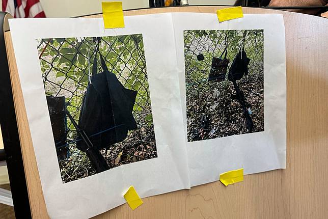 Photos that show an AK-47 rifle, a backpack and a Go-Pro camera on a fence outside Trump International Golf Club taken after an apparent assassination attempt of Republican presidential candidate former President Donald Trump, are displayed during a news conference at the Palm Beach County Main Library, Sunday. Sept. 15, 2024, in West Palm Beach, Fla. (AP Photo/Stephany Matat)