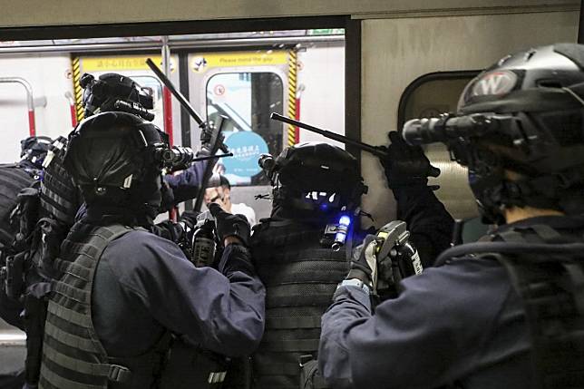 Riot police arrest an anti-government protester inside Prince Edward MTR station during a chaotic incident on August 31. Photo: Handout