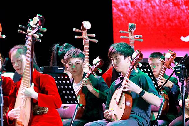 Members of the Great Wall Youth Orchestra play traditional Chinese instruments at the New Year concert in Shijiazhuang, north China's Hebei Province, Dec. 29, 2024. (Photo by Wang Zijie/Xinhua)