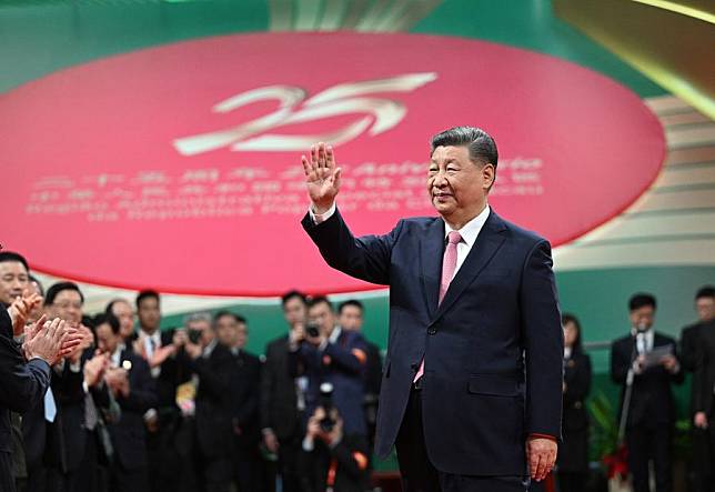 Chinese President Xi Jinping, also general secretary of the Communist Party of China Central Committee and chairman of the Central Military Commission, waves to the participants at a meeting celebrating the 25th anniversary of Macao's return to the motherland and the inaugural ceremony of the sixth-term government of the Macao Special Administrative Region (SAR), at the Macao East Asian Games Dome in Macao, south China, Dec. 20, 2024. (Xinhua/Xie Huanchi)