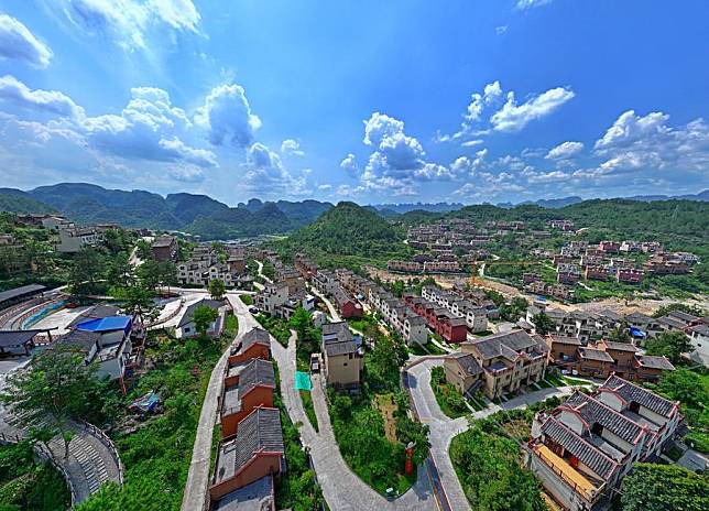 An aerial drone photo taken on Aug. 28, 2024 shows a poverty-relief relocation site for the Baiku Yao People in Nandan County, south China's Guangxi Zhuang Autonomous Region. (Xinhua/Zhou Hua)