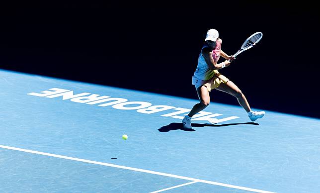 Iga Swiatek hits a return during the women's singles second round match against Rebecca Sramkova of Slovakia at the Australian Open tennis tournament in Melbourne, Australia, Jan. 16, 2025. (Photo by Hu Jingchen/Xinhua)