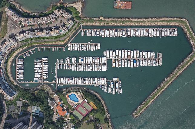 An aerial view of Discovery Bay. Yacht broker Anthony Rendall says the triangular harbour is too small for superyachts that need a lot of space to manoeuvre. Photo: Roy Issa