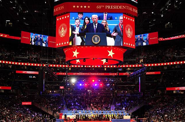 U.S. President Donald Trump (on the screen) attends the presidential parade at Capital One arena in Washington, D.C., the United States, on Jan. 20, 2025. (Xinhua/Wu Xiaoling)