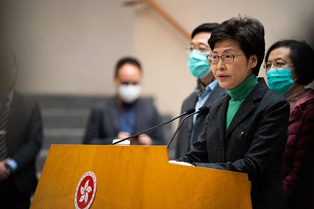 Chief Executive Carrie Lam announces on February 8 that travellers from the mainland will be quarantined for 14 days. Her government is so unpopular that it can do no right. Photo: DPA