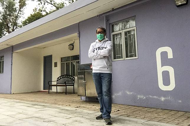 Dr Stewart Chan stands in front of the bungalow he was quarantined in at Lady MacLehose Holiday Village. Photo: Handout