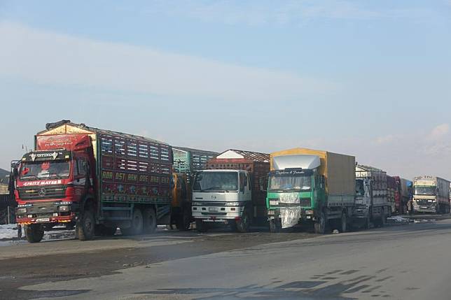 This photo taken on Jan. 5, 2025 shows trucks in Kabul, capital of Afghanistan. (Photo by Saifurahman Safi/Xinhua)