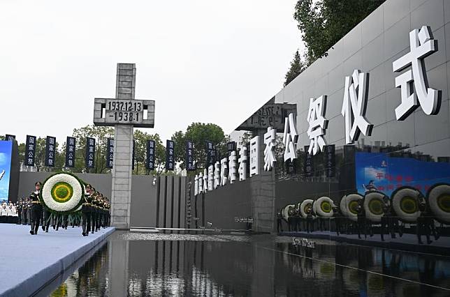 China holds its 10th national memorial ceremony for the Nanjing Massacre victims at the Memorial Hall of the Victims in Nanjing Massacre by Japanese Invaders in Nanjing, capital of east China's Jiangsu Province, Dec. 13, 2023. (Xinhua/Ji Chunpeng)