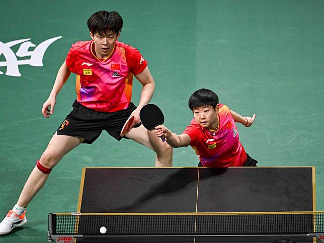 Wang Chuqin/Sun Yingsha &reg; of China compete during the mixed doubles match against Cho Daeseong/Shin Yubin of South Korea at the final match between China and South Korea at the ITTF Mixed Team World Cup 2024 in Chengdu, southwest China's Sichuan Province, Dec. 8, 2024. (Xinhua/Wang Xi)