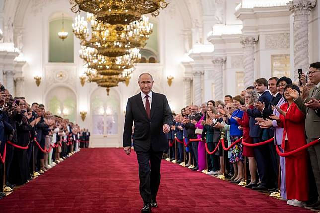 Vladimir Putin attends an inauguration ceremony at the Kremlin in Moscow, Russia, May 7, 2024. Russia will overcome all obstacles and achieve its goals in development, Vladimir Putin said Tuesday when he was sworn in as Russian president. (Xinhua/Cao Yang)