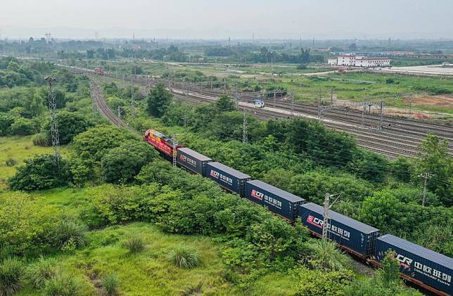 Aerial photo taken on June 30, 2022 shows a China-Europe freight train pulling out of the Chengdu International Railway Port in Chengdu, southwest China's Sichuan Province. (Xinhua/Wang Xi)