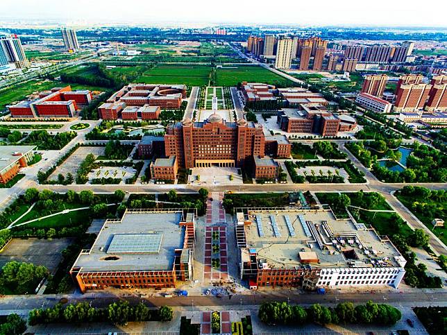 Photo taken on July 31, 2017 shows the campus of Inner Mongolia University in Hohhot, capital of north China's Inner Mongolia Autonomous Region. (Xinhua/Chen Bin)