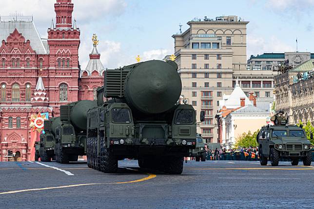 Military vehicles carrying ballistic missiles drive along Red Square during a rehearsal for the Victory Day military parade, in Moscow, Russia, May 5, 2024. (Xinhua/Bai Xueqi)