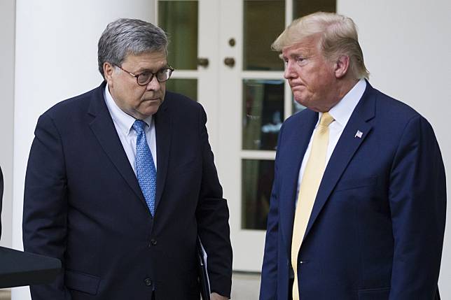Attorney General William Barr and President Donald Trump turn to leave after speaking in the Rose Garden of the White House in July 2019. Barr has sparked a backlash after apparently walking back a sentencing recommendation for Trump’s friend Roger Stone. Photo: AP