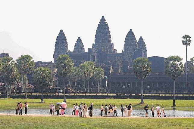 Tourists visit the Angkor Wat in Siem Reap province, Cambodia on Feb. 10, 2024. (Photo by Sao Khuth/Xinhua)