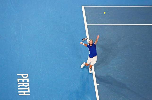 Stefanos Tsitsipas of Greece serves during the men's singles match against Pablo Carreno Busta of Spain in the Group C round robin match between Greece and Spain at the 2025 United Cup tennis tournament in Perth, Australia, Dec. 28, 2024. (Photo by Zhou Dan/Xinhua)