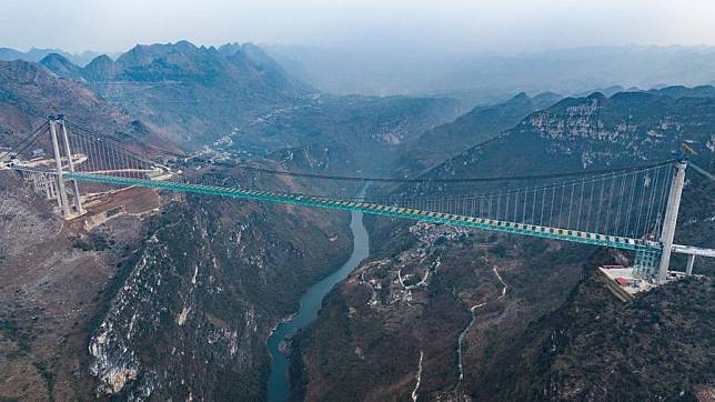 An aerial drone photo taken on Jan. 17, 2025 shows a view of the Huajiang Grand Canyon Bridge in southwest China's Guizhou Province. (Xinhua/Tao Liang)