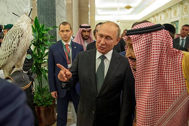 Russian President Vladimir Putin talks to Saudi Arabia’s King Salman during his visit to the Middle East this week. Photo: Reuters