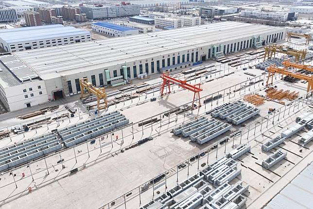 An aerial drone photo taken on March 14, 2024 shows a workshop of Gansu Bori Traffic Heavy Equipment Manufacturing Co., Ltd. in Lanzhou New Area of Lanzhou, northwest China's Gansu Province. (Xinhua/Ma Xiping)