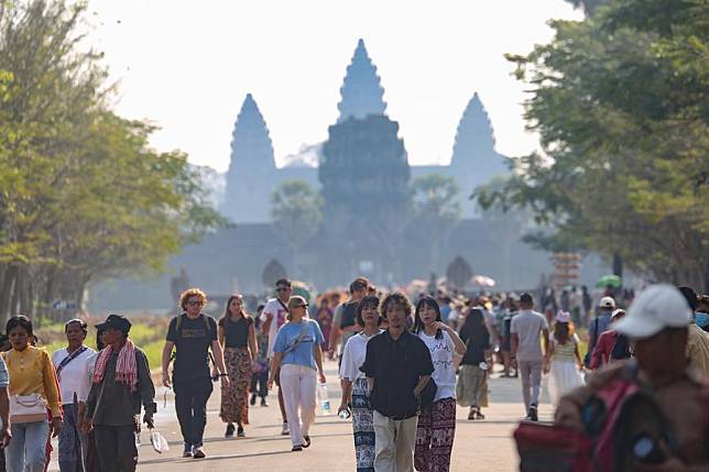 Tourists visit the Angkor Wat in Siem Reap province, Cambodia on Feb. 10, 2024. (Photo by Sao Khuth/Xinhua)