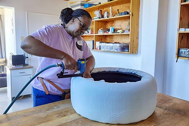 Samueline Uapingene-Masule works at a workshop in Windhoek, Namibia, Dec. 5, 2024. (Photo by Ndalimpinga Iita/ Xinhua)