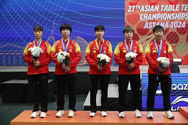 Chinese players attend the award ceremony after the women's team final against Japan at the 27th ITTF-Asian Table Tennis Championships in Astana, Kazakhstan, on Oct. 9, 2024. (Photo by Kalizhan Ospanov/Xinhua)