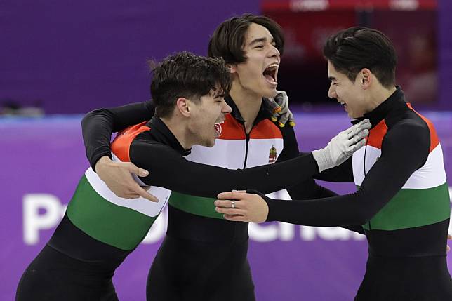 Csaba Burjan (left) celebrates Winter Olympics gold with his teammates in Pyeongchang. Photo: AP