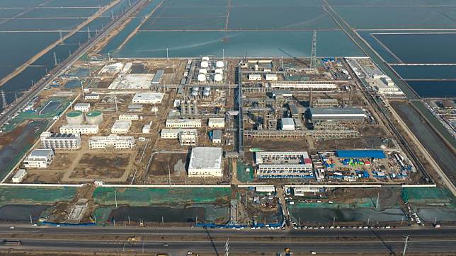 An aerial drone photo taken on Jan. 12, 2024 shows the construction site of a natural gas processing terminal project in Binzhou City, east China's Shandong Province. (Photo by Du Penghui/Xinhua)