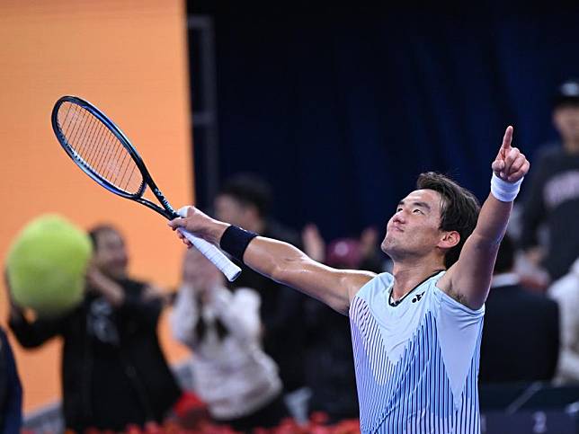 China's Buyunchaokete celebrates after winning the men's singles quarterfinal against Andrey Rublev of Russia at 2024 China Open tennis tournament in Beijing, capital of China, Sept. 30, 2024. (Xinhua/Zhang Long)