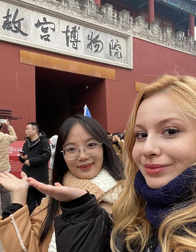 Nursena Burus &reg;, a 19-year-old from the historic city of Manisa on Türkiye's Aegean coast, visits the Forbidden City with her friend in Beijing, capital of China, Nov. 24, 2024. (Xinhua)