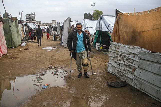 Palestinians are seen among tents for displaced people in the Al-Yarmouk stadium in Gaza City, on Nov. 24, 2024. (Photo by Mahmoud Zaki/Xinhua)