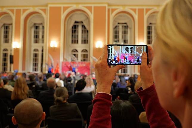 A guest takes photos during the 2025 Year of the Snake &ldquo;Happy Spring Festival&rdquo; New Year Celebration Gala and Spring Festival Reception at Berlin's Red City Hall in Berlin, Germany, on Jan. 17, 2025. (Xinhua/Tai Sicong)