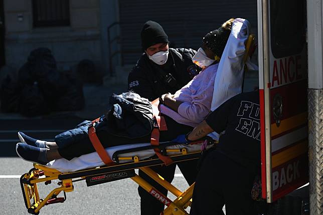 Total US coronavirus cases have passed the 164,000 mark amid a new wave of outbreaks and pressure on overwhelmed hospitals like those in New York City, which is bracing for the peak of the pandemic. Photo: AFP