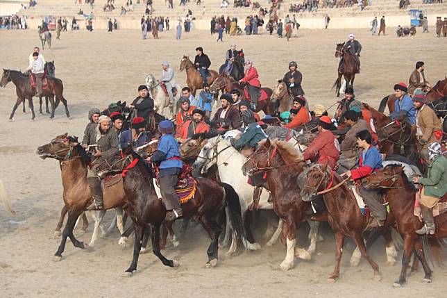 Afghan horse riders compete in a Buzkashi game in Balkh province, Afghanistan, Nov. 22, 2024.(M Fardin Nawrozi/Xinhua)