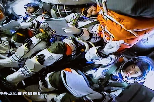 This image captured at Beijing Aerospace Control Center on Oct. 30, 2024 shows the crew of Shenzhou-19 manned spaceship. (Photo by Han Qiyang/Xinhua)