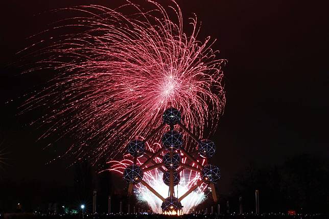 Fireworks explode over the Atomium in celebration of the New Year in Brussels, Belgium, Jan. 1, 2025. (Xinhua/Zhao Dingzhe)