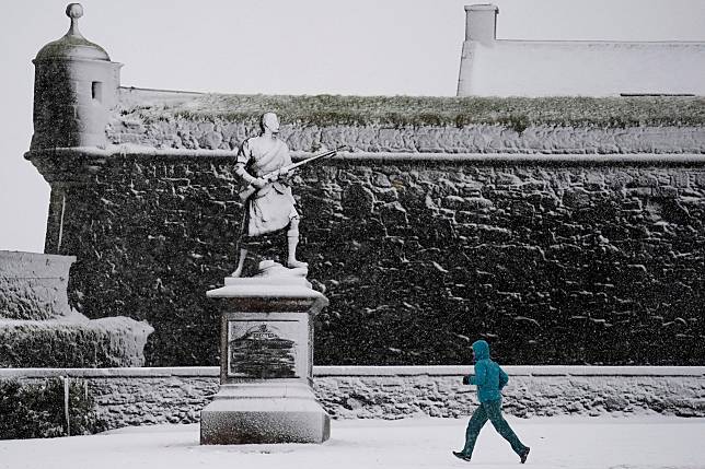 英國因風暴「伯特」來襲，各地降下大雨和暴雪，低溫甚至來到-12.4度。（圖／美聯社）