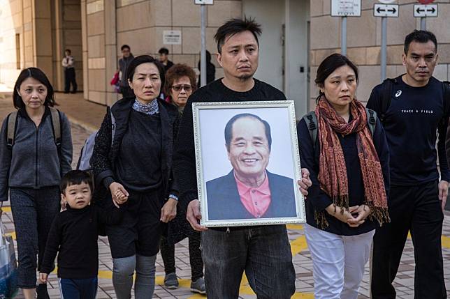 Yau Ming Poon’s family walks out of court on January 17. Photo: Brian Wong