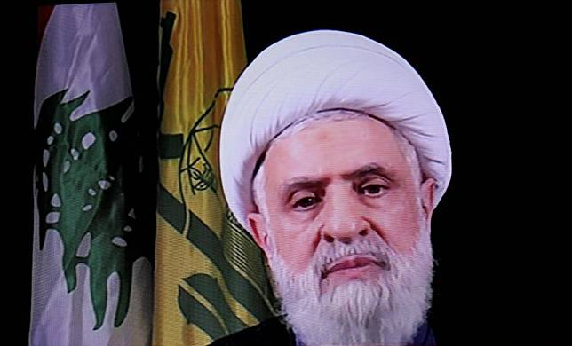 A screen shows Hezbollah's new leader Sheikh Naim Qassem delivering a televised speech on Oct. 30, 2024. (Xinhua/Bilal Jawich)