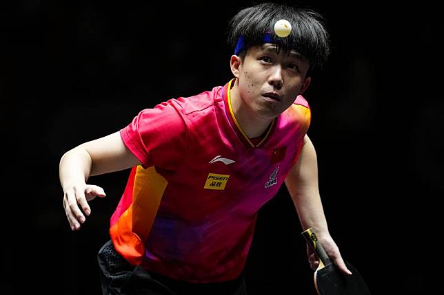 Wang Chuqin serves in the men's singles final against Tomokazu Harimoto at the 2024 World Table Tennis (WTT) Finals in Kitakyushu, Japan on Nov. 24, 2024. (Xinhua/Zhang Xiaoyu)