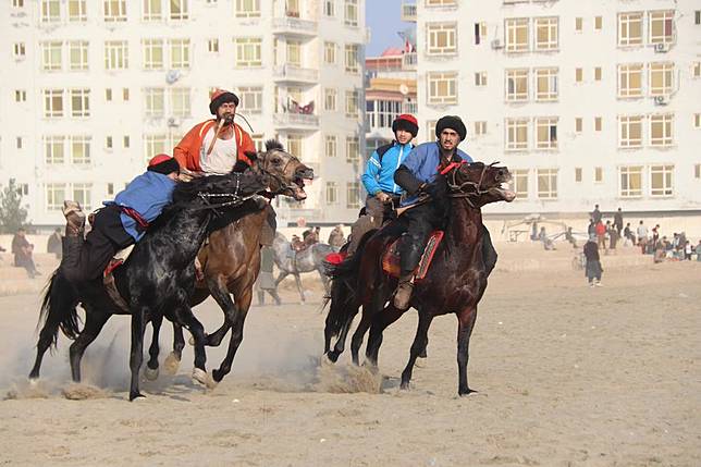 Afghan horse riders compete in a Buzkashi game in Balkh province, Afghanistan, Nov. 22, 2024. (Photo by M Fardin Nawrozi/Xinhua)