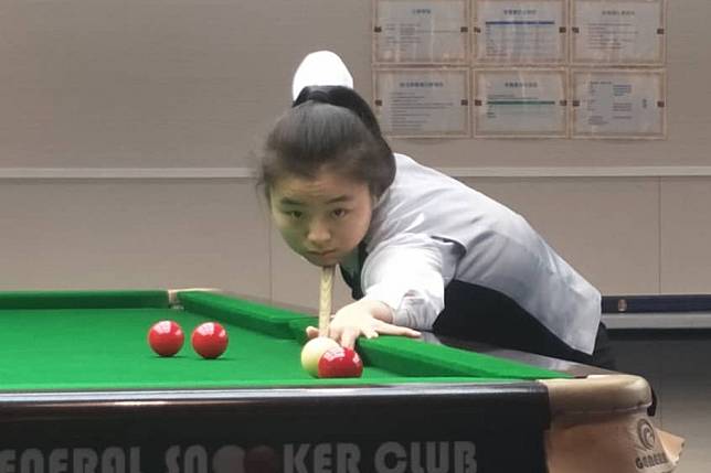 Bai Yulu lines up a shot against Rebecca Kenna at the General Snooker Club. Photo: Handout