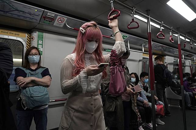 Passengers wear protective face masks in the Hong Kong subway. Photo: AP