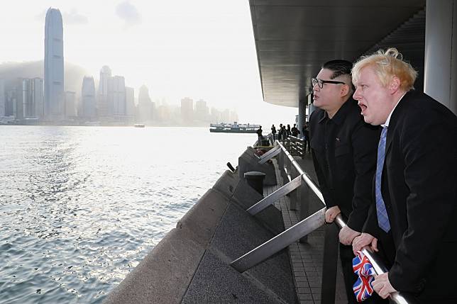 Boris Johnson performer Drew Galdron takes the Star Ferry in Hong Kong with Kin Jong-un impersonator Howard X. “The real Boris isn’t prepared to say anything in favour of the pro-democracy movement in Hong Kong. So I’m here to show my support and my solidarity,” he said. Photo: Dickson Lee